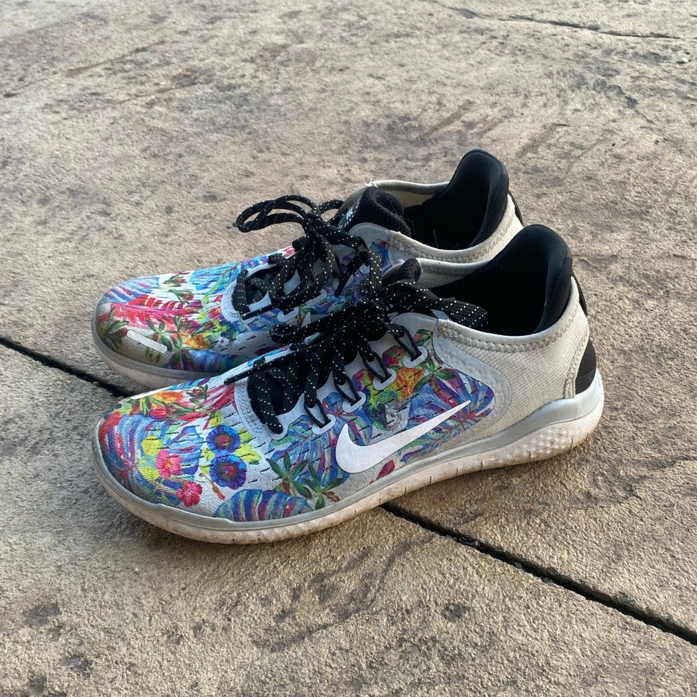 Size 7.5 Nike Free RN 2018 floral pure platinum woman’s running shoe.